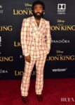 Donald Glover Rocks A Summery Check Suit For 'The Lion King' World Premiere