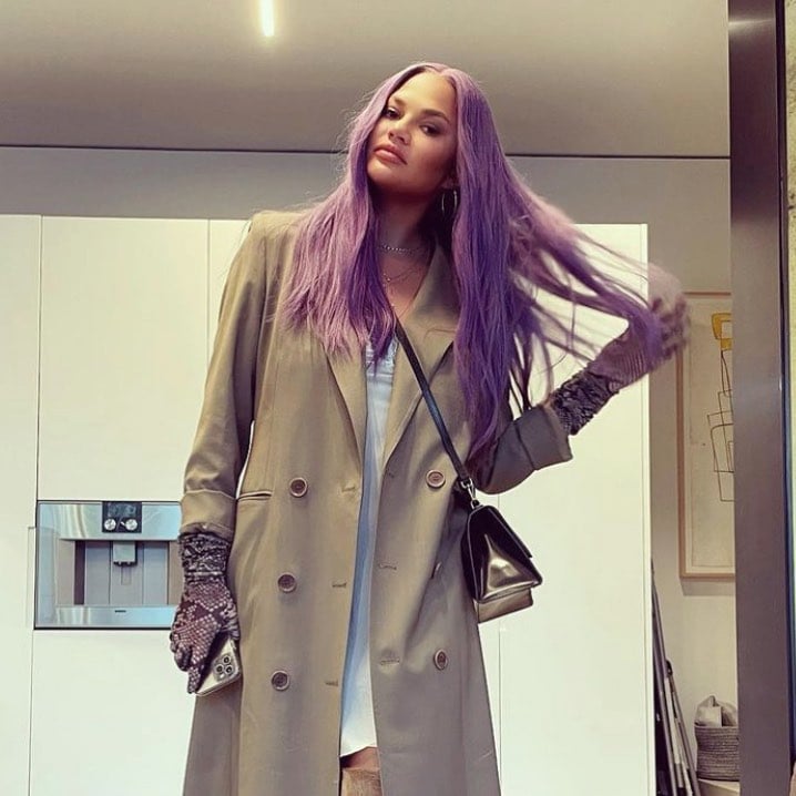 Chrissy Teigen Debuts Lavender Hair Wearing Envelope 1976