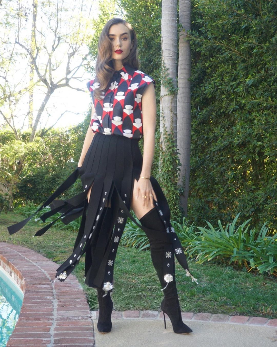 Lily Collins Wore Prada Promoting ‘Mank’