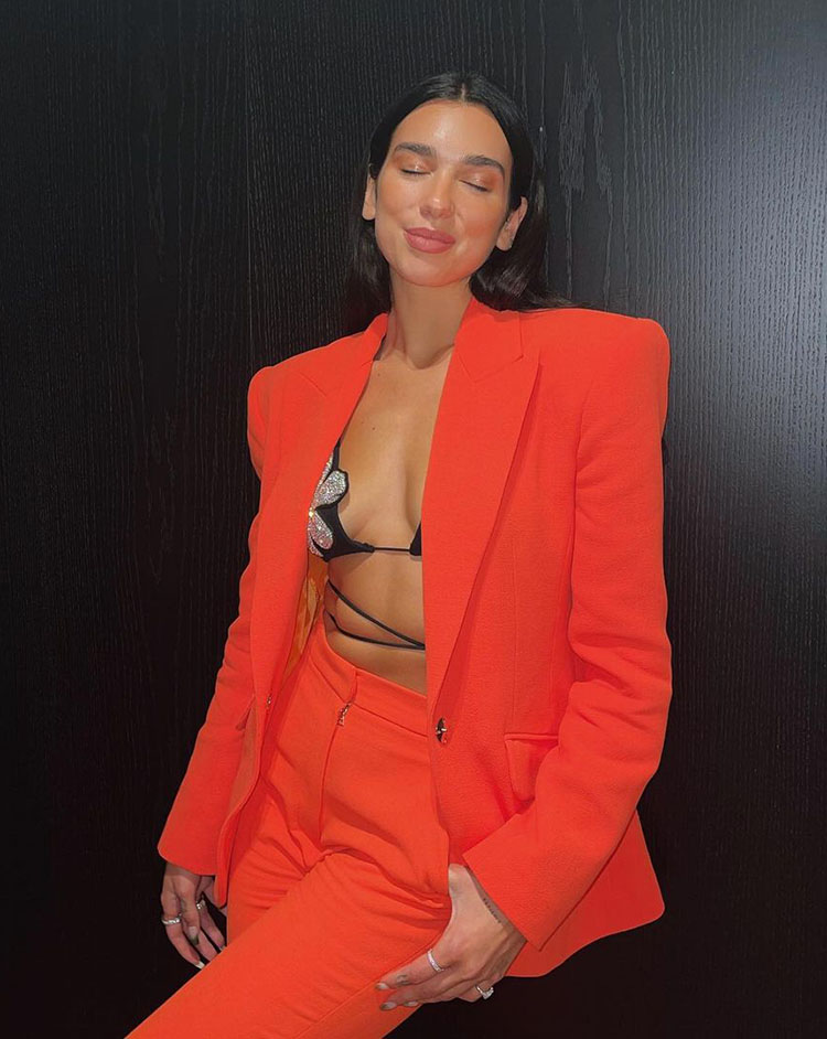 Dua Lipa Parties In Orange Suiting From David Koma