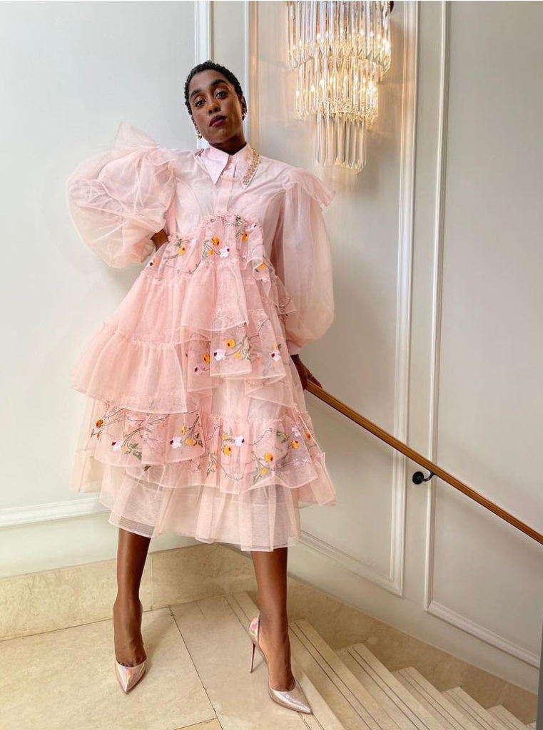 Lashana Lynch Wore Prada & Simone Rocha Promoting 'No Time To Die'