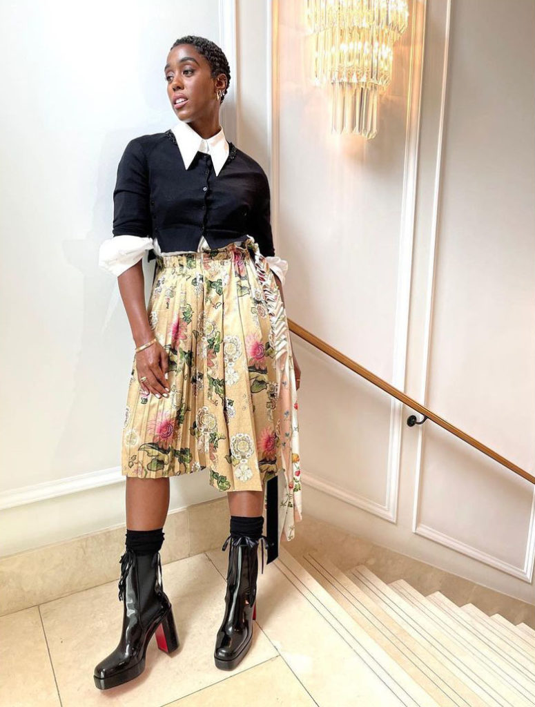 Lashana Lynch Wore Prada & Simone Rocha Promoting 'No Time To Die'