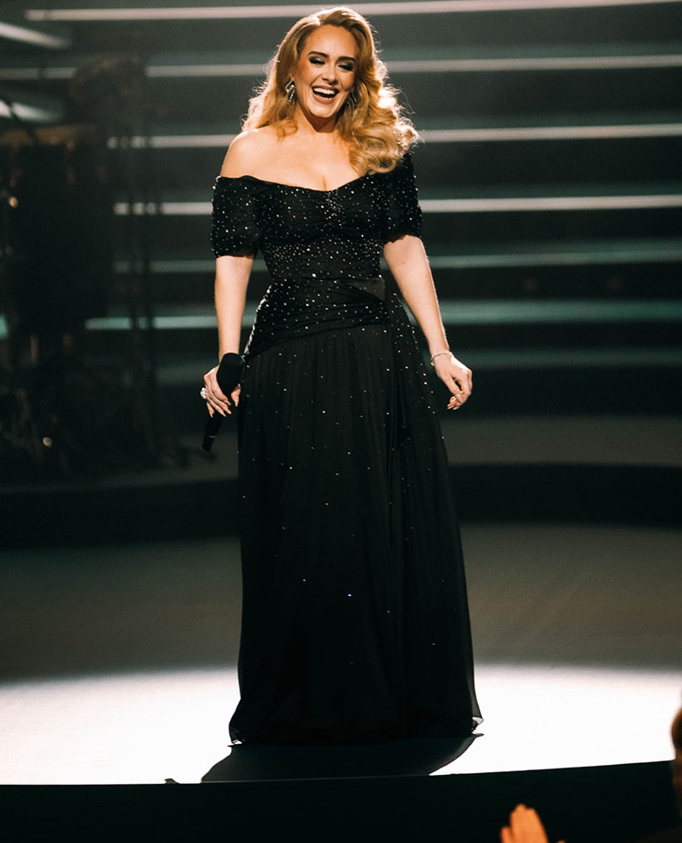 Adele Sparkles in Louis Vuitton & Schiaparelli Gowns at London Concert – WWD
