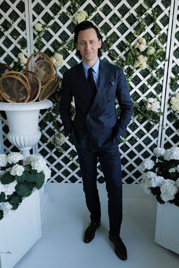 Tom Hiddleston, wearing Ralph Lauren, attends the Ralph Lauren Suite during The Championships, Wimbledon 2022 