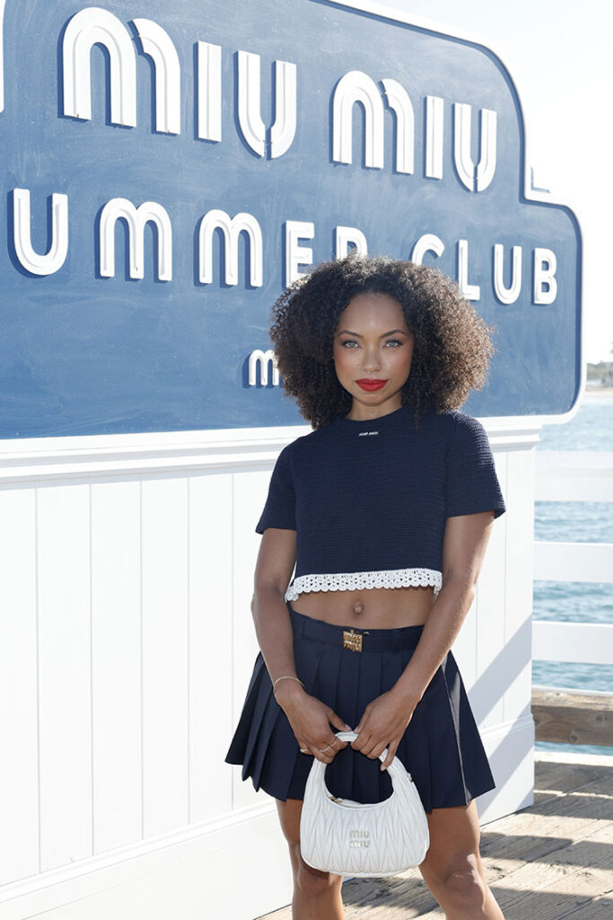 Logan Browning attends Miu Miu Summer Club Malibu at the Malibu Pier 