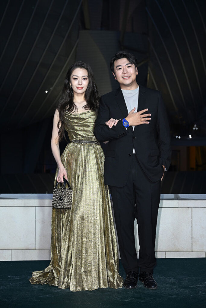 Gina Alice Redlinger and Lang Lang attend 'Prelude to the Olympics' at Fondation Louis Vuitton