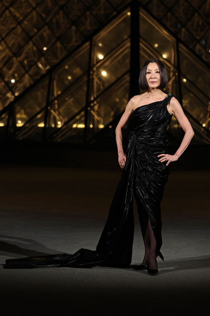 Michelle Yeoh attends the "Le Grand Diner du Louvre" Arrivals Photocall 