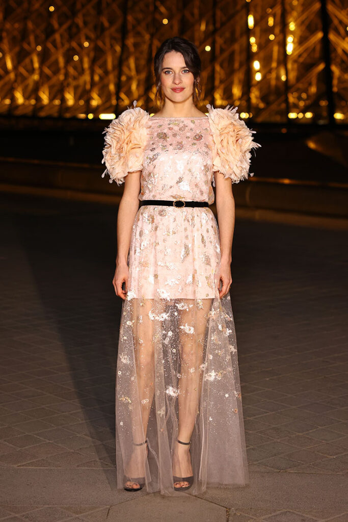 Rebecca Marder attends the "Le Grand Diner du Louvre" Arrivals Photocall 