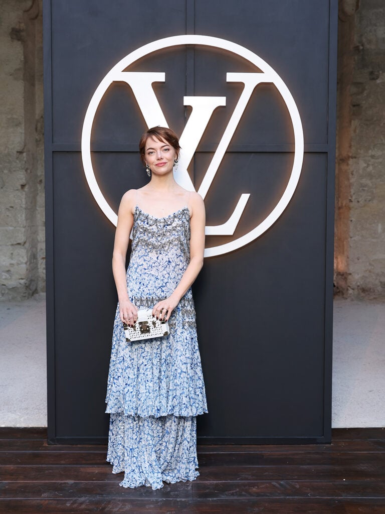 Emma Stone attends the Louis Vuitton Cruise Fashion Show