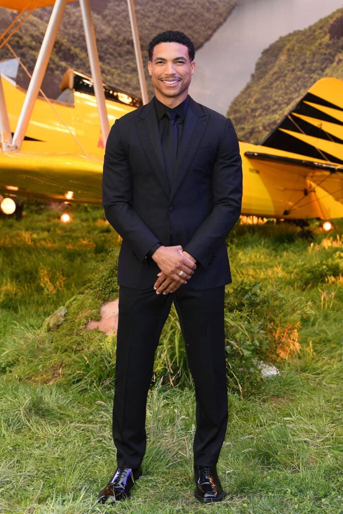 Greg Tarzan Davis attends the "Mission: Impossible - The Final Reckoning" London Premiere 2025 Brioni suit