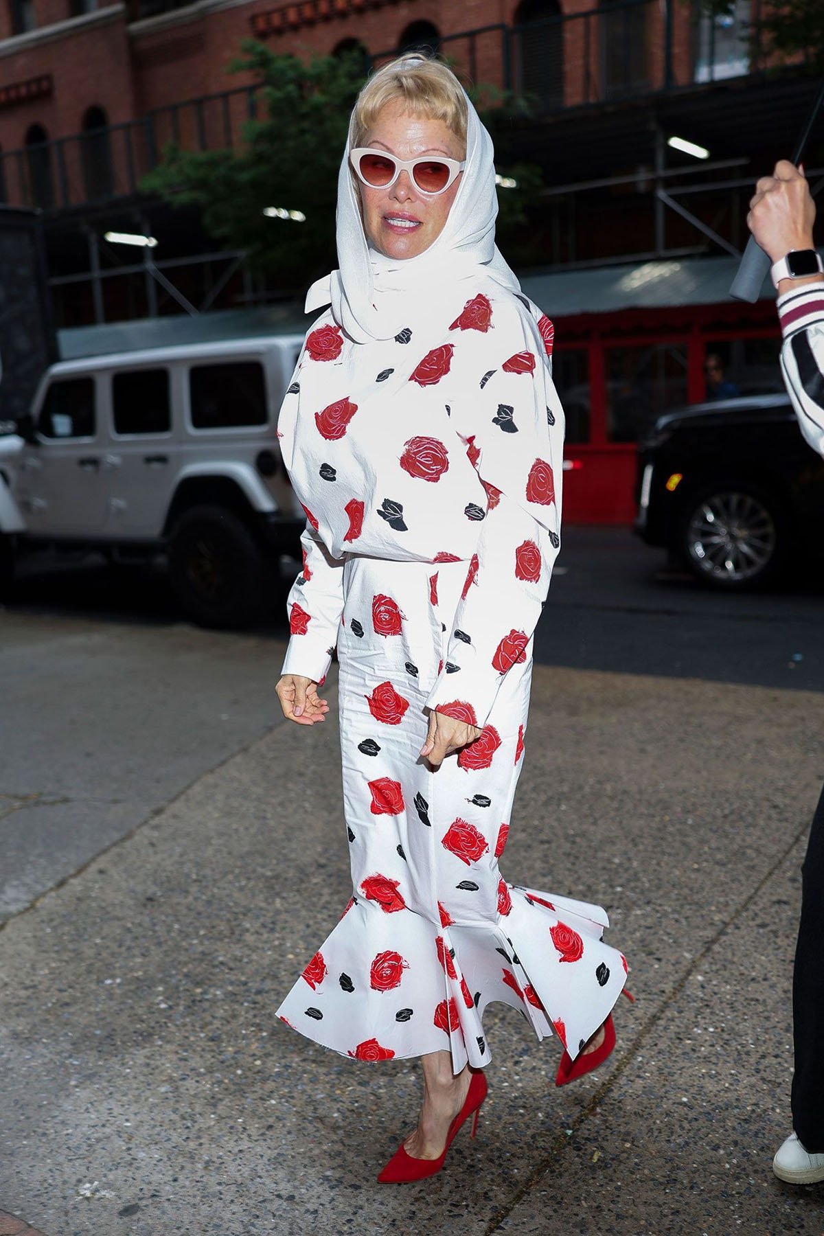 Pamela Anderson Channels Retro Glamour While Promoting ‘The Naked Gun’ Reboot