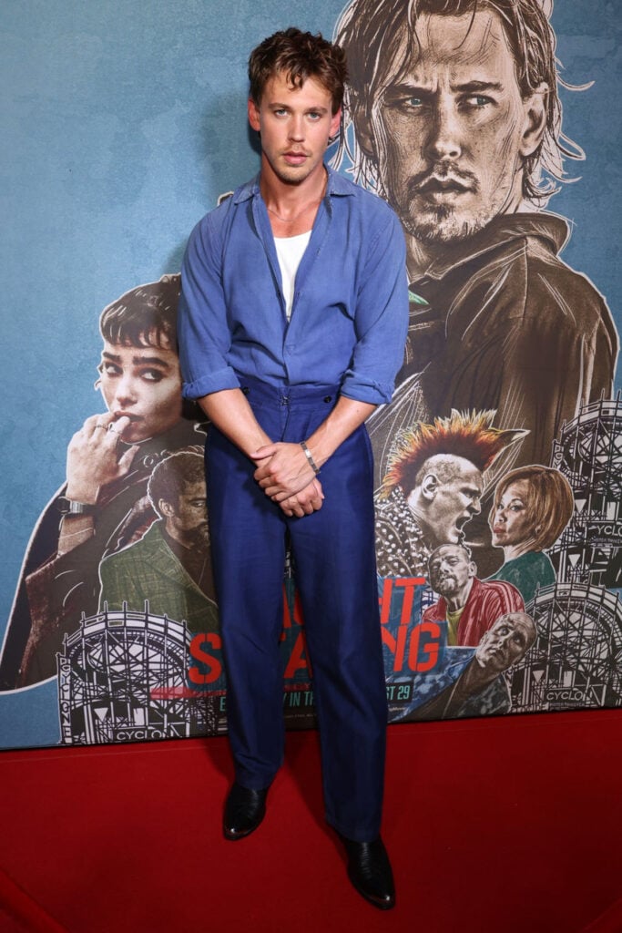 Austin Butler attends the "Caught Stealing" Austin, TX Special Screening  blue shirt and blue trousers 