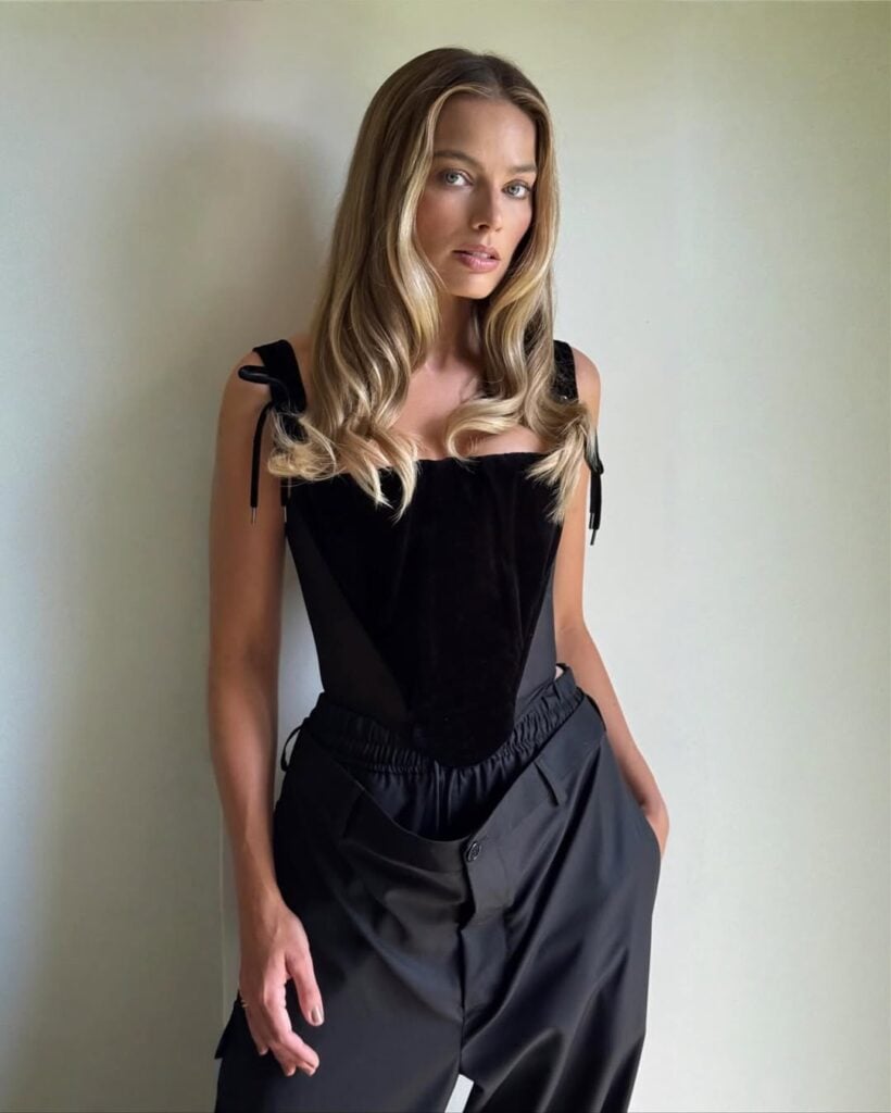 Margot Robbie Wore Vivienne Westwood To The Press Junket For ‘A Big Bold Beautiful Journey’ Margot Robbie style, Margot Robbie Vivienne Westwood, Margot Robbie trousers, A Big Bold Beautiful Journey press tour, Vivienne Westwood fashion