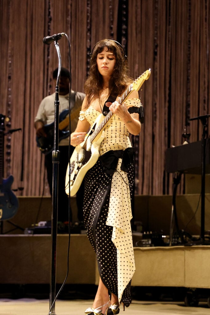 Clairo Wore Valentino for Her 2025 All Things Go NYC Performance, Clairo Valentino All Things Go 2025, Clairo Valentino Alessandro Michele, Clairo polka dot dress, Valentino Garavani bow pumps,