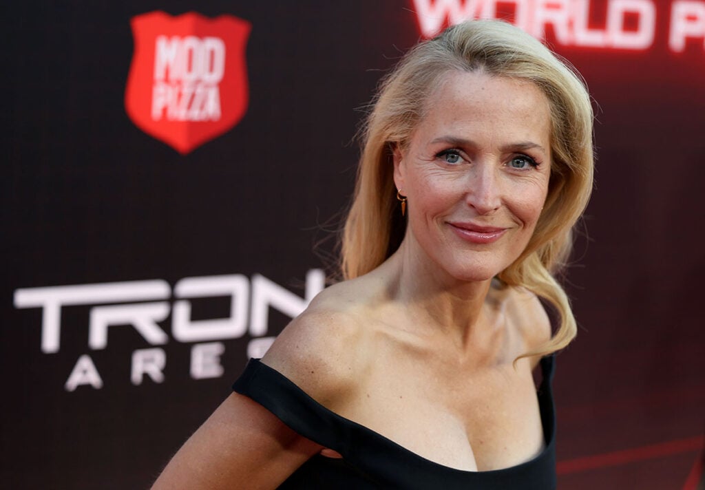 Gillian Anderson Wore Magda Butrym To The ‘Tron: Ares’ LA Premiere, Gillian Anderson Tron: Ares premiere, Magda Butrym, Magda Butrym Fall 2025, Tron: Ares red carpet, Magda Butrym black dress, Hollywood premiere, Gillian Anderson red carpet,