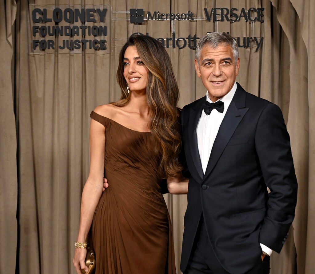Amal Clooney Wore Atelier Versace To The Clooney Foundation For Justice’s The Albies, Amal Clooney Atelier Versace, The Albies 2025, Clooney Foundation for Justice, Amal Clooney brown gown, George Clooney Armani tuxedo,