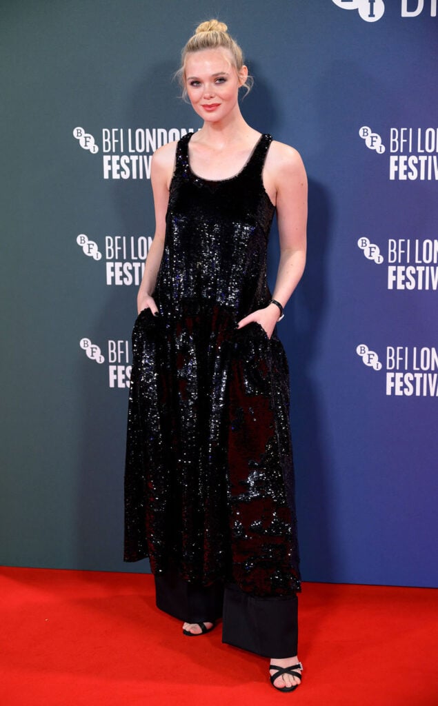 Elle Fanning Wore Simone Rocha To The 'Sentimental Value' London Film Festival Premiere, Elle Fanning, Simone Rocha Spring 2026, London Film Festival, Sentimental Value premiere, Samantha McMillen, Manolo Blahnik Ramisli Sandals, Cartier Panthere De Cartier Ring
