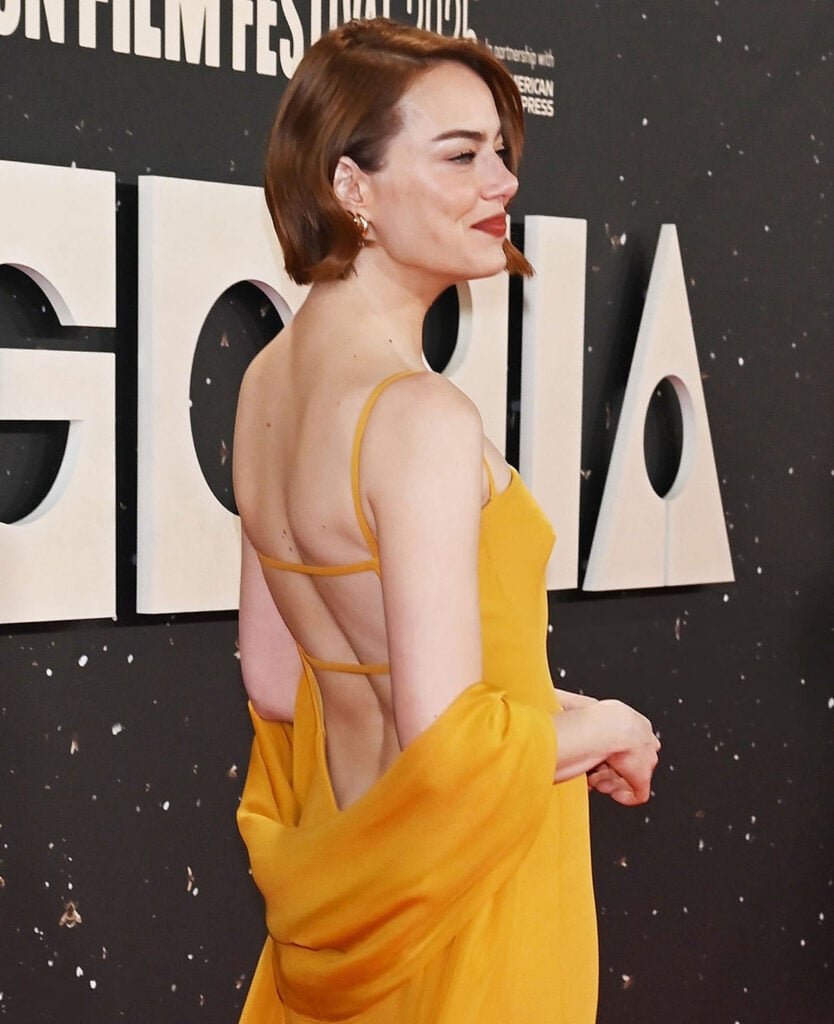 Emma Stone Wore Louis Vuitton To The 'Bugonia' London Film Festival Premiere, Emma Stone, Louis Vuitton, Bugonia premiere, London Film Festival 2025, Emma Stone red carpet, Louis Vuitton custom gown, mustard yellow dress