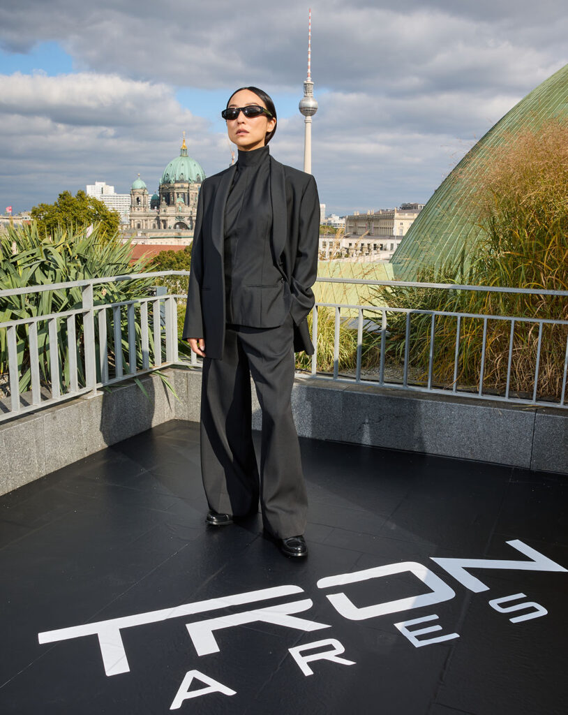 Greta Lee attends the “TRON: ARES” Berlin Photocall at Hotel de Rome, The Row, Greta Lee The Row  black suit, Greta Lee Tron Ares, Greta Lee The Row, Greta Lee Eckhaus Latta Spring 2026, Greta Lee Diotima Basseterre dress, Tron Ares Berlin premiere, Tron Ares London sneak peek