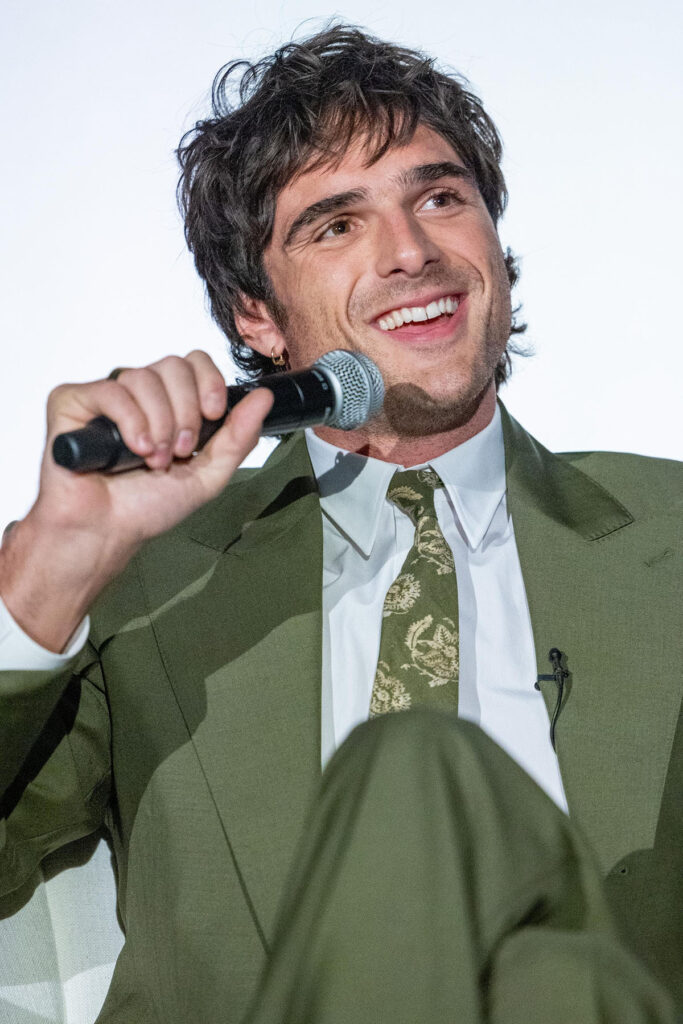 Jacob Elordi, Celine, Newport Beach Film Festival, Frankenstein press tour, olive green suit, paisley tie, Cartier jewellery, Celine Luco Triomphe loafers