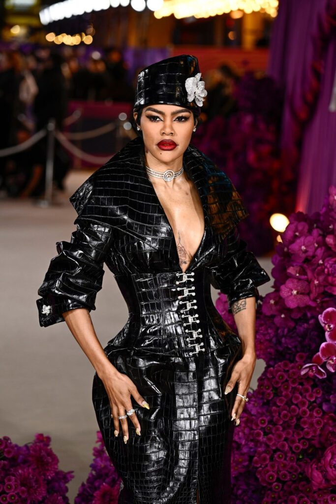 Teyana Taylor, Tamara Ralph, Tamara Ralph Fall 2025 Couture, All’s Fair London premiere, celebrity red carpet, crocodile-embossed leather, black corset dress, structured silhouette, gothic glamour, Grace Jones inspiration, femme fatale fashion, couture fashion moment, diamond choker, bold red lip, British designer, power dressing, leather couture, statement fashion look, haute couture red carpet