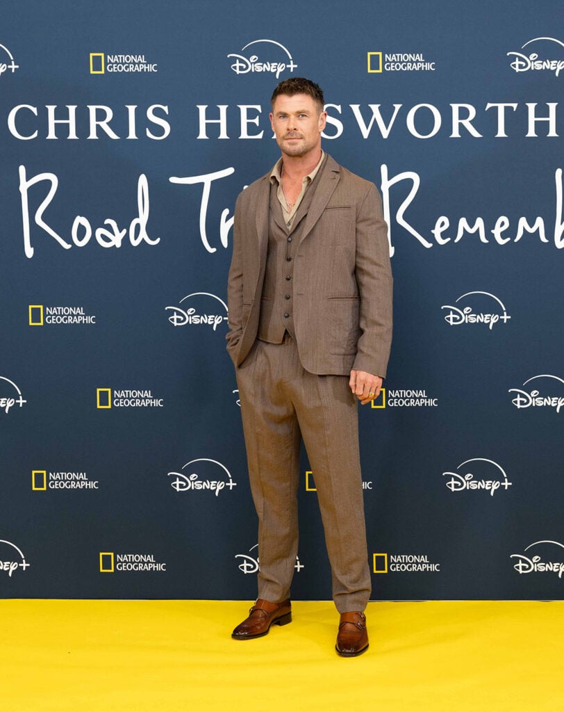 Chris Hemsworth, A Road Trip to Remember red carpet, National Geographic, Disney+, brown three-piece suit