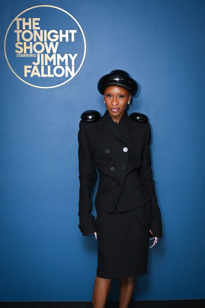 Cynthia Erivo Wore Schiaparelli On The Tonight Show Starring Jimmy Fallon, Cynthia Erivo, Schiaparelli Spring 2026, Wicked: For Good, Simply More book, The Tonight Show Starring Jimmy Fallon, Bird on a Rock by Tiffany, Christian Louboutin Hot Chick pumps