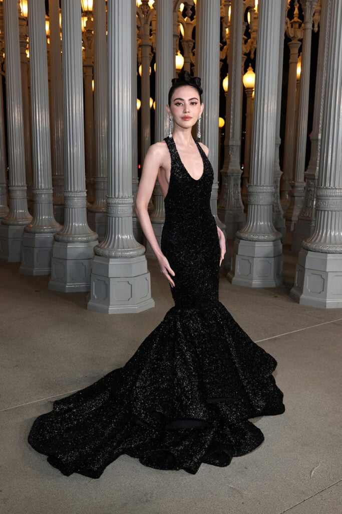 Davika Hoorne, wearing Gucci, attends the 2025 LACMA Art+Film Gala, Davika Hoorne Gucci black dress, Davika Hoorne LACMA Art+Film Gala red carpet, Davika Hoorne halterneck gown, Davika Hoorne red carpet drama