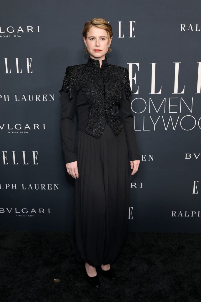 Jessie Buckley, wearing Ralph Lauren, attends ELLE's 2025 Women in Hollywood Celebration, Jessie Buckley, Jessie Buckley Ralph Lauren, black Ralph Lauren look, embellished bolero jacket, dramatic black outfit, Jessie Buckley red carpet 2025, Elle Women in Hollywood