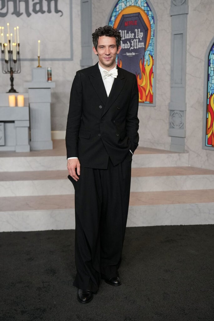 Josh O'Connor at Netflix's "Wake Up Dead Man: A Knives Out Mystery" premiere, Josh O’Connor Wake Up Dead Man LA premiere red carpet, Dior menswear, Dior black suit, Josh O’Connor white bow tie, Knives Out Mystery premiere menswear