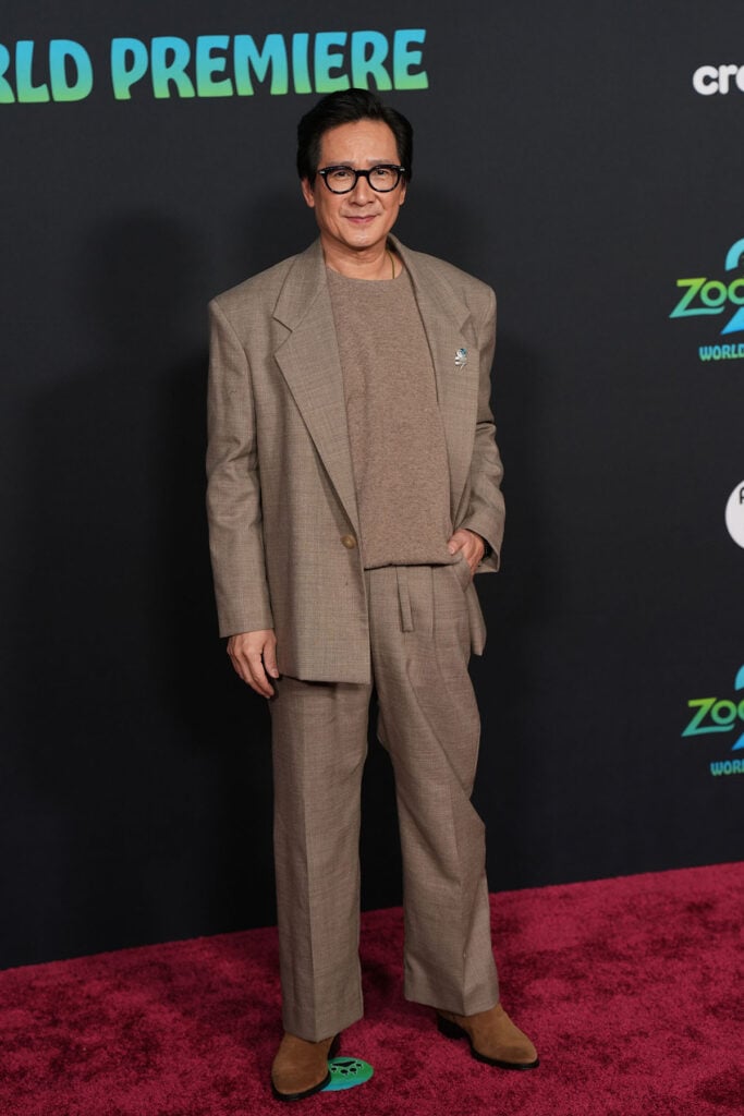 Ke Huy Quan attends the premiere of Walt Disney Studios' "Zootopia 2"  Ke Huy Quan, Zootopia 2 LA premiere red carpet, Fear of God suit