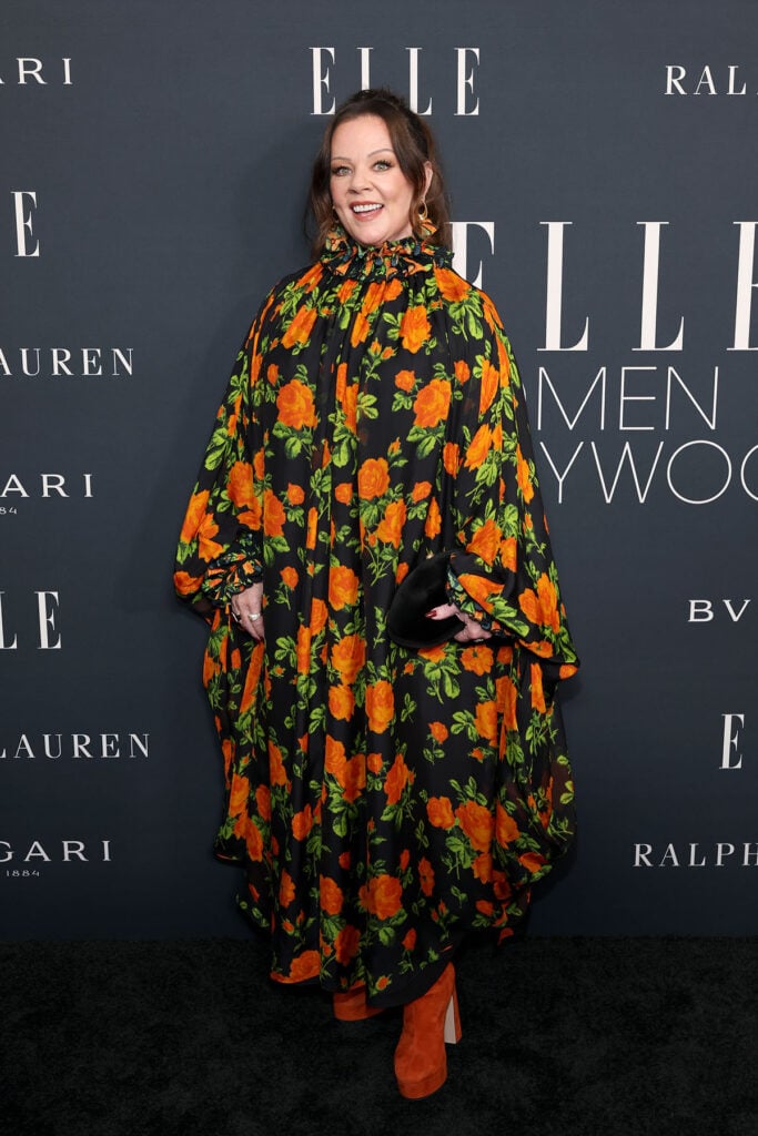 Melissa McCarthy attends ELLE's 2025 Women in Hollywood Celebration, Melissa McCarthy, Melissa McCarthy Richard Quinn, Richard Quinn floral dress, black and orange floral gown, platform boots red carpet, Melissa McCarthy style 2025, Elle Women in Hollywood