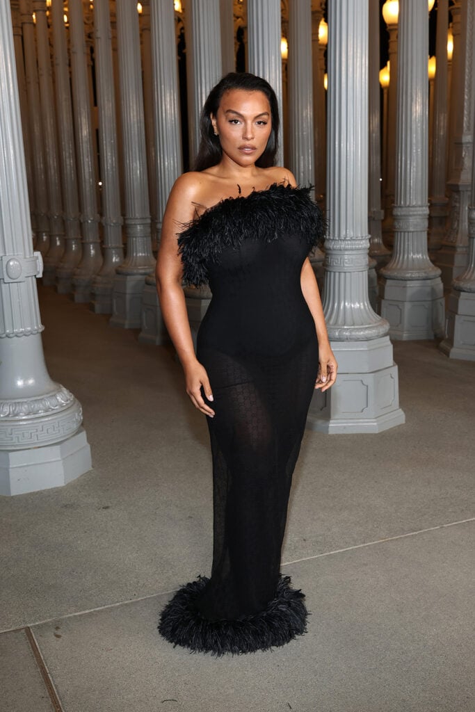 Paloma Elsesser, wearing Gucci, attends the 2025 LACMA Art+Film Gala, Paloma Elsesser Gucci gold dress, Paloma Elsesser LACMA Art+Film Gala red carpet, Paloma Elsesser strapless gown, Paloma Elsesser Gucci Spring 2026
