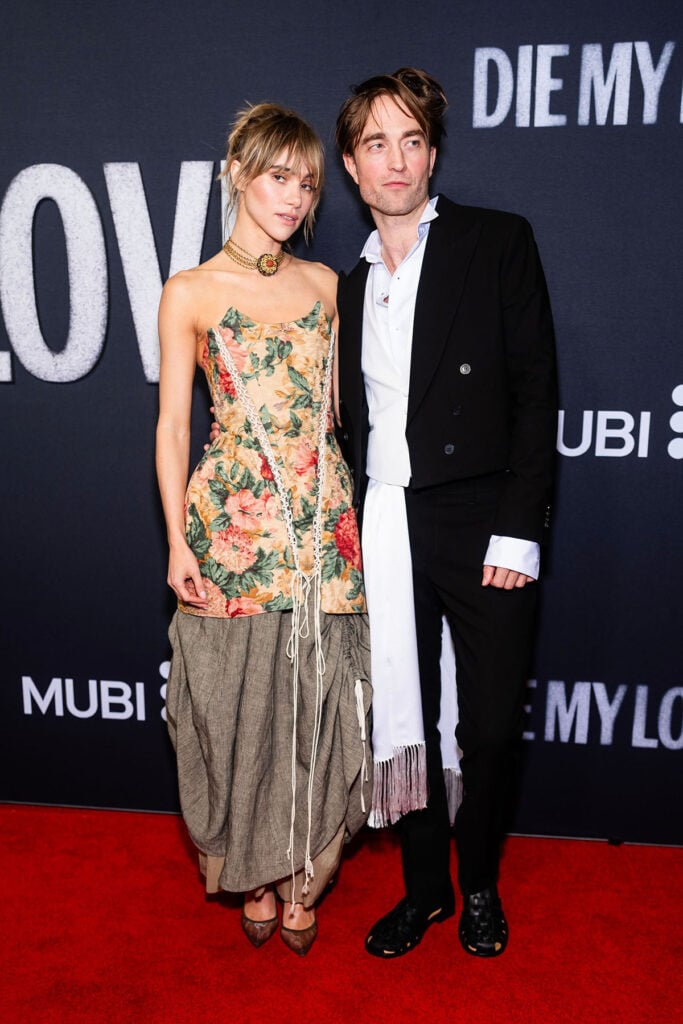 Suki Waterhouse (L) and Robert Pattinson attend the "Die My Love" New York premiere