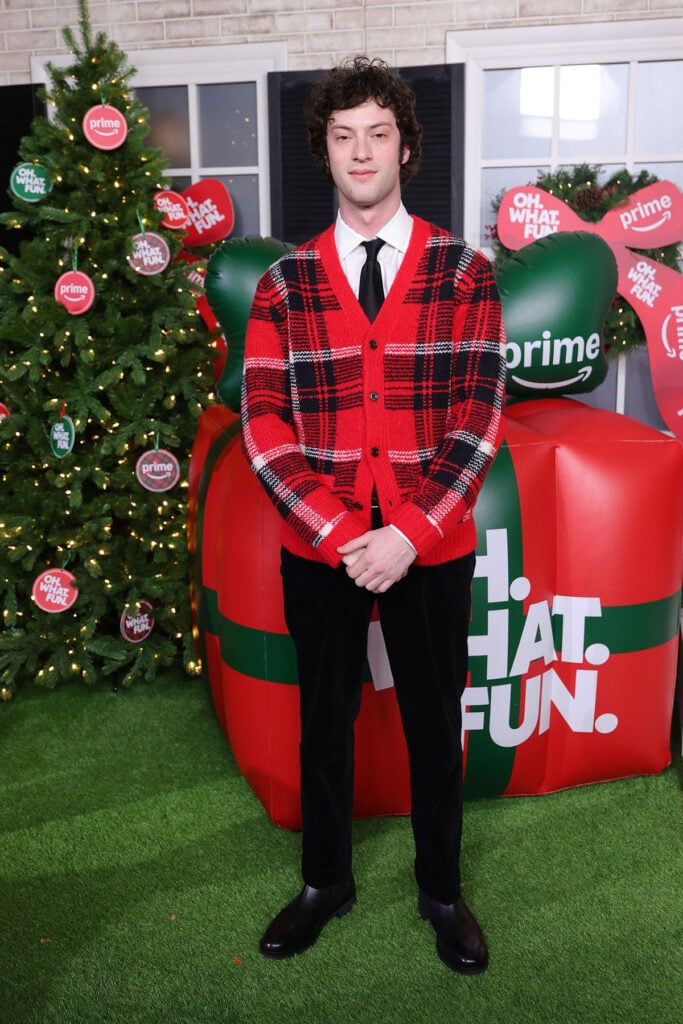 Dominic Sessa attends the premiere of Amazon MGM Studios' "Oh. What. Fun." Dominic Sessa, Ralph Lauren, Ralph Lauren plaid cardigan, menswear red carpet, Oh What Fun premiere red carpet