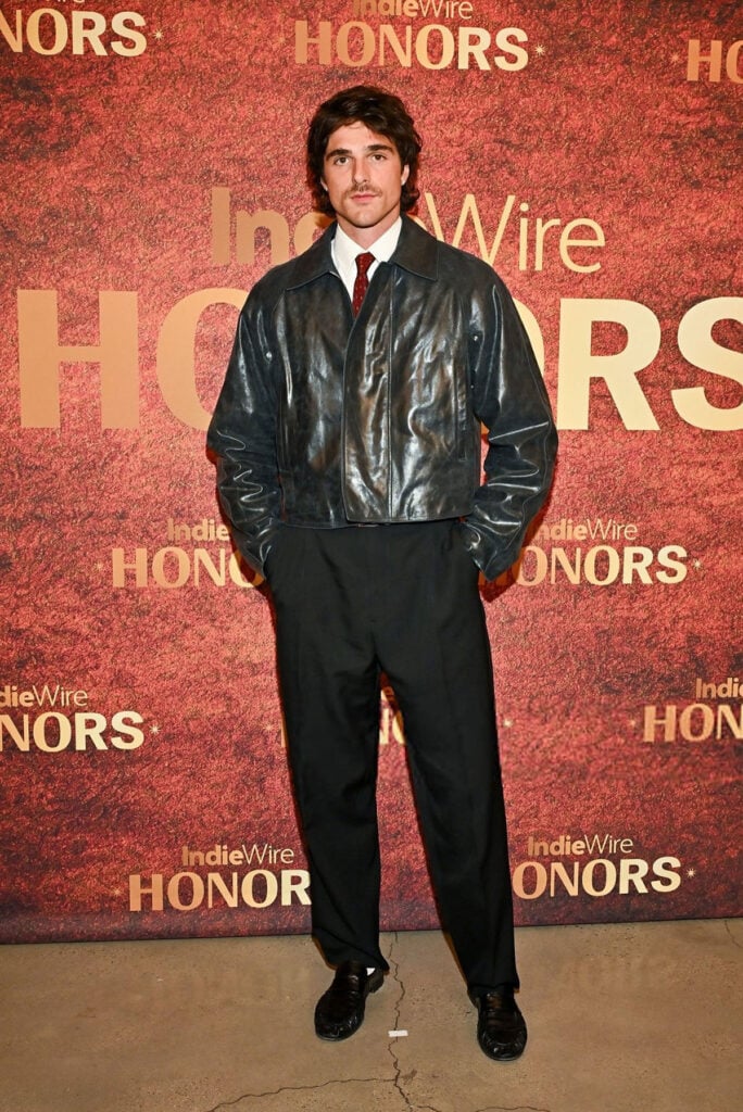 Jacob Elordi at The IndieWire Honors Winter Film Awards 2025 , Riz Ahmed Red Sea International Film Festival menswear, Saint Laurent mens suit red carpet, Walton Goggins McQueen skull scarf Fallout London screening, Aaron Moten AMI Paris mint suit, Jacob Elordi cropped leather jacket tailoring, IndieWire Honors menswear 2025, Benito Skinner Calvin Klein Collection Fall 2025 NYMag Culturati Cocktail