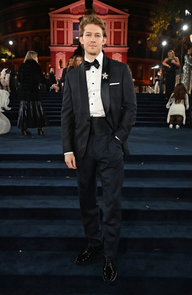 Joe Alwyn attends The Fashion Awards 2025, Joe Alwyn Brunello Cucinelli, Brunello Cucinelli Prince of Wales tuxedo, Brunello Cucinelli menswear, Fashion Awards 2025 red carpet, British Fashion Awards red carpet