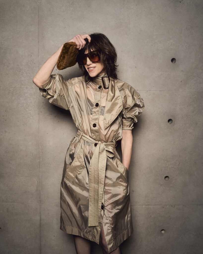 Charlotte Gainsbourg, Saint Laurent front row, Paris Fashion Week, windbreaker coat, effortless style, French actress fashion, Saint Laurent womenswear