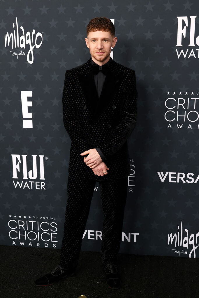 Chris Perfetti, 2026 Critics’ Choice Awards menswear, Emporio Armani velvet tuxedo, polka dot tuxedo, velvet menswear trend, red carpet tailoring