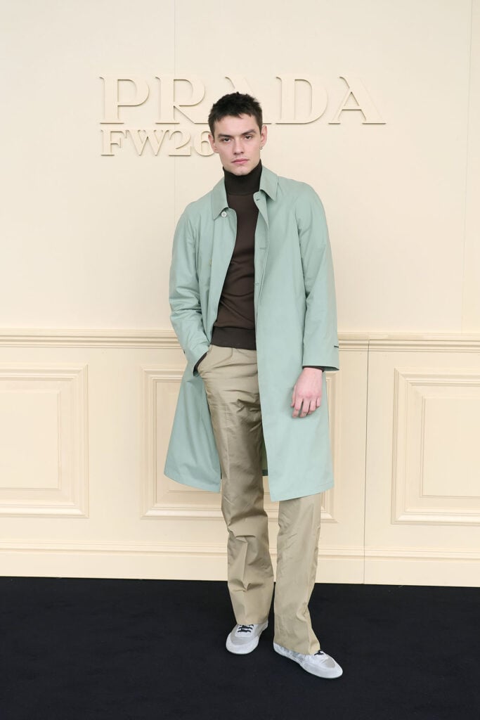 Kevin Costner, Jack O’Connell, Tom Blyth, Hudson Williams, Damson Idris, Nicholas Hoult, Louis Partridge, Rauw Alejandro, James Norton, Milan Fashion Week menswear, Paris Fashion Week menswear, menswear front row celebrities, fashion week menswear style, Brioni menswear, Armani menswear, Prada menswear, Tod’s menswear