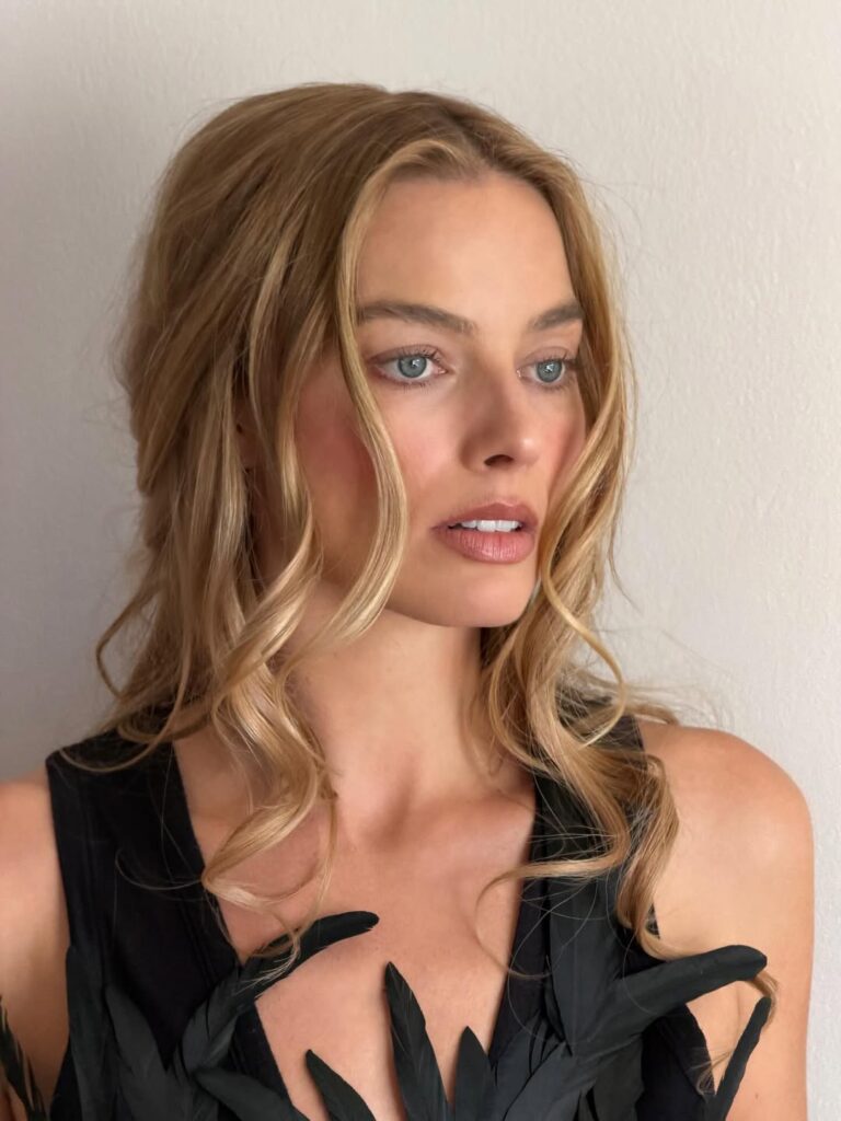 Margot Robbie, Margot Robbie Wuthering Heights, Margot Robbie fashion, Andrew Mukamal stylist, Victoria Beckham Spring 2026, Margot Robbie method dressing, Wuthering Heights film, Catherine Earnshaw Margot Robbie, celebrity styling analysis