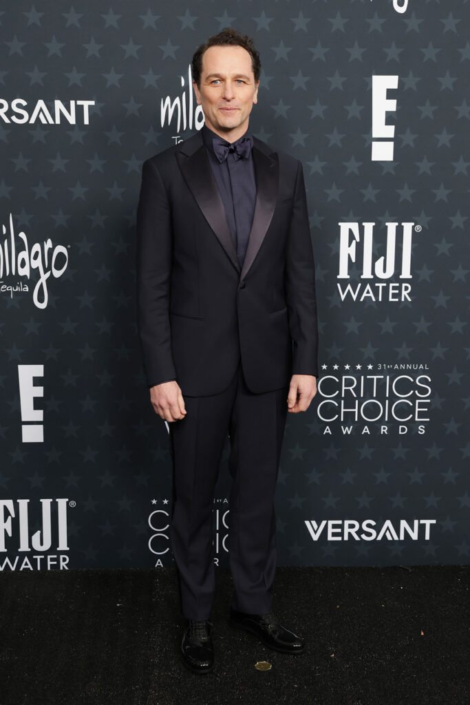 Matthew Rhys, 2026 Critics’ Choice Awards menswear, Armani tailoring, classic menswear red carpet, couples red carpet style, awards season suits