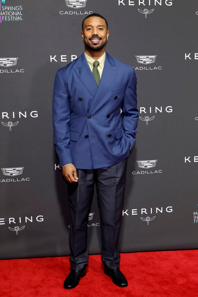 Michael B Jordan, Michael B Jordan red carpet, Palm Springs International Film Awards menswear, Prada men’s suit, coloured suit men’s fashion, Michael B Jordan style