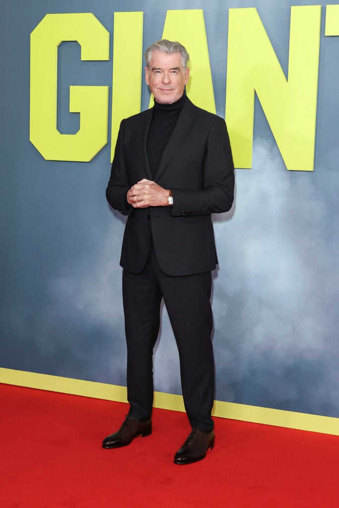 Pierce Brosnan, Giant London premiere, Armani menswear, black turtleneck suit, menswear premiere look, classic tailoring red carpet, menswear icon, evening suit styling