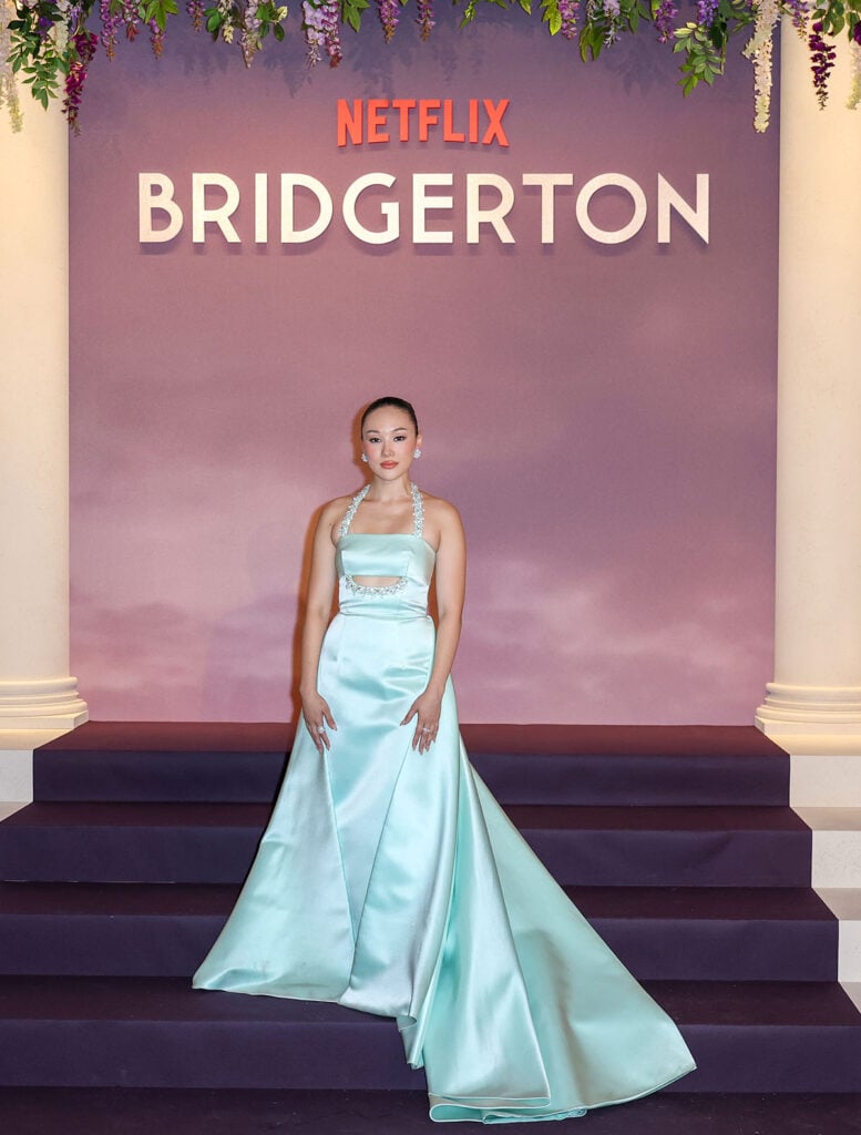 Yerin Ha Wore Prada To The ‘Bridgerton’ Season 4 Paris World Premiere, Yerin Ha, Bridgerton season 4, Bridgerton season 4 world premiere, Bridgerton Paris premiere red carpet, Yerin Ha Prada, Prada aqua green gown, Sophie Baek Bridgerton, Bridgerton cast Paris, Regency-era glamour, Holly White stylist