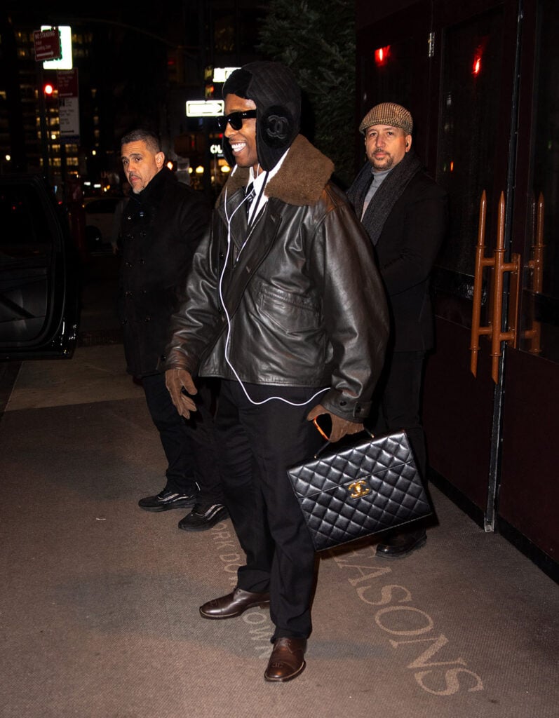A$AP Rocky, A$AP Rocky Chanel, A$AP Rocky Chanel Spring 2026, Chanel Spring 2026 collection, A$AP Rocky New York style, Chanel menswear accessories, Chanel hooded cape, Chanel leather bag green, celebrity menswear street style, Chanel ambassador style