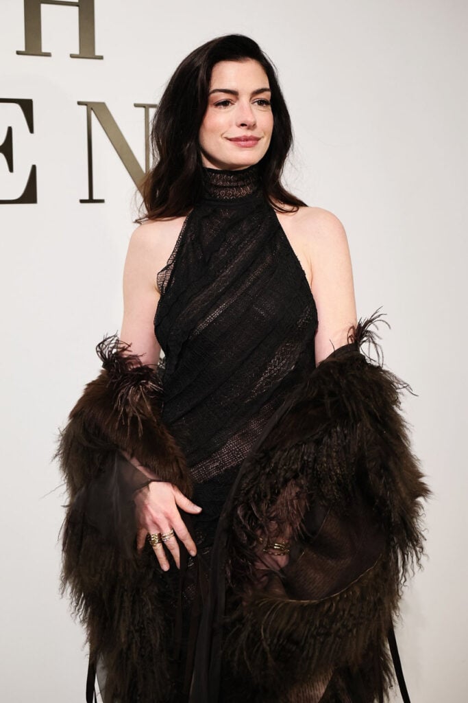 Anne Hathaway, Ralph Lauren Fall 2026, Ralph Lauren Women’s Collection Fall 2026, Anne Hathaway Ralph Lauren, New York runway show, Ralph Lauren eveningwear, Anne Hathaway black gown, celebrity front row style
