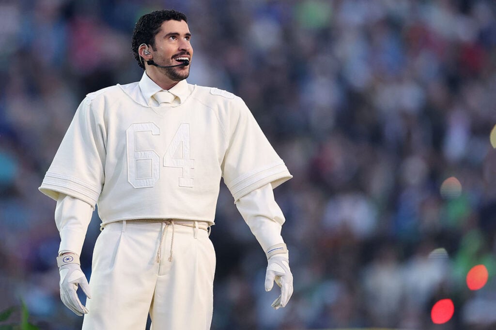 Bad Bunny performs onstage during the Apple Music Super Bowl LX Halftime Show, Bad Bunny Super Bowl LX, Bad Bunny halftime show 2026, Bad Bunny Zara Super Bowl, Bad Bunny Super Bowl outfit, Puerto Rican symbolism Super Bowl, Bad Bunny 64 jersey, Bad Bunny Ocasio jersey, Super Bowl LX halftime fashion