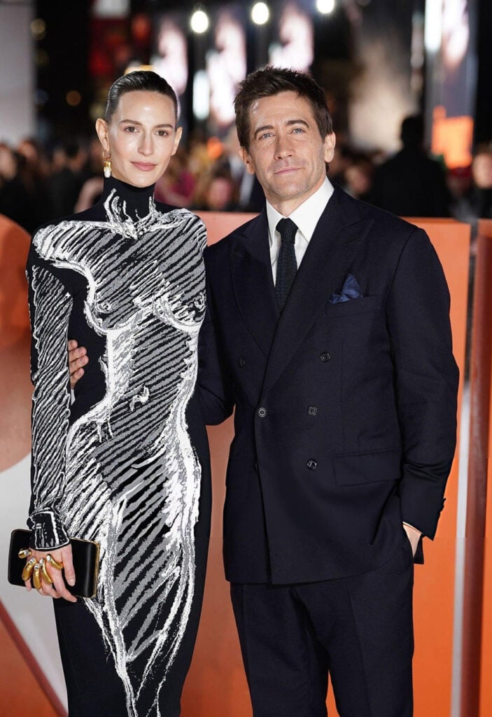 Jeanne Cadieu, Jake Gyllenhaal, The Bride! premiere, Schiaparelli Spring 2026, Jeanne Cadieu Schiaparelli dress, Jake Gyllenhaal girlfriend, London world premiere fashion, Schiaparelli trompe l’oeil
