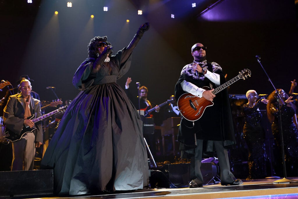 Lauryn Hill and Wyclef Jean perform onstage during the 68th GRAMMY Awards, Lauryn Hill, 2026 Grammys, Grammy Awards tribute, Lauryn Hill performance, Roberta Flack tribute, D’Angelo tribute, Carolina Herrera Spring 2026, Grammys stage fashion, music legacy moment, Grammys ceremony
